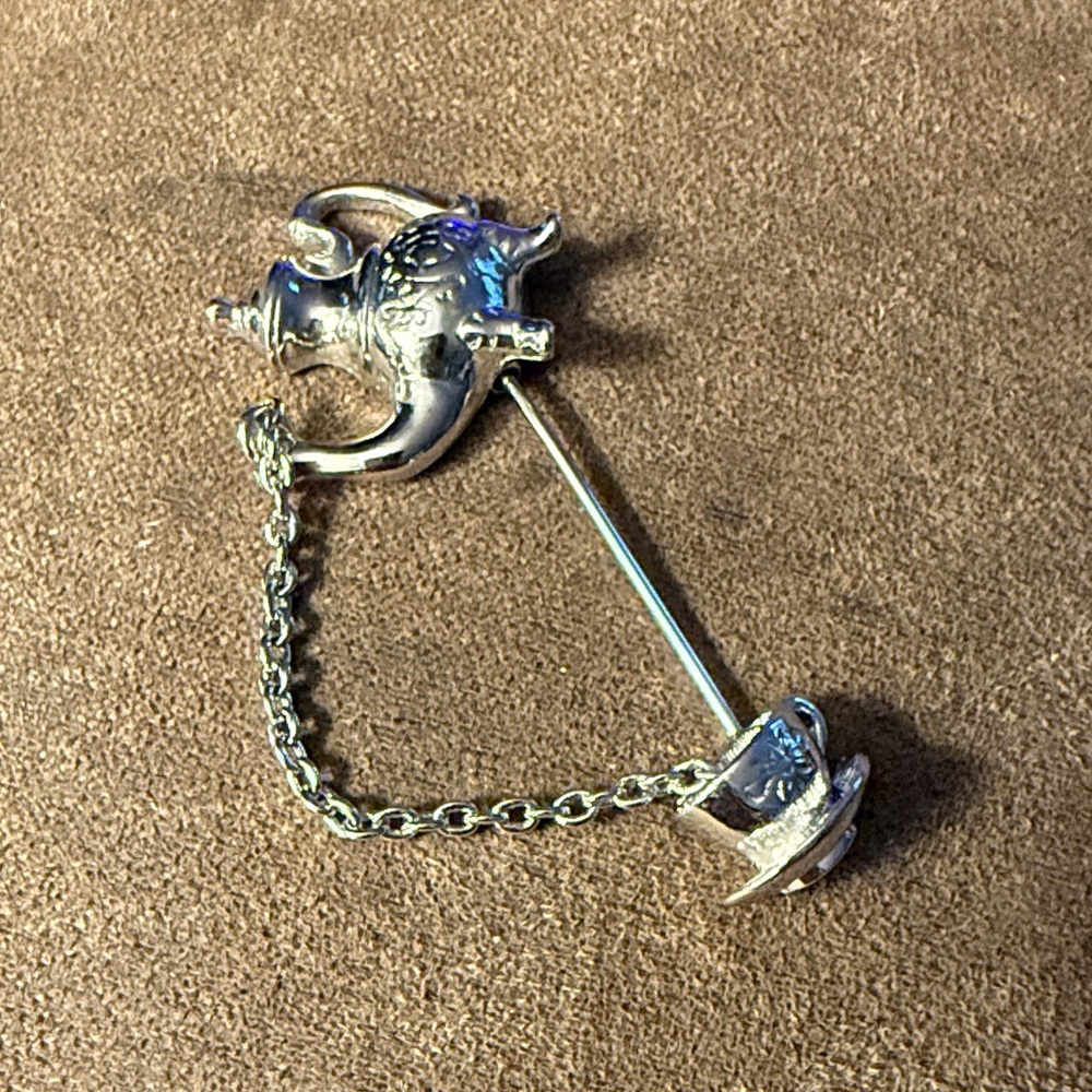 Avon silver tone teapot and cup brooch stickpin.